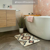 Karndean Fumo stone flooring laid in herringbone in a bathroom