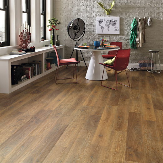 Classic limed oak mid brown rigid core flooring in a dining room